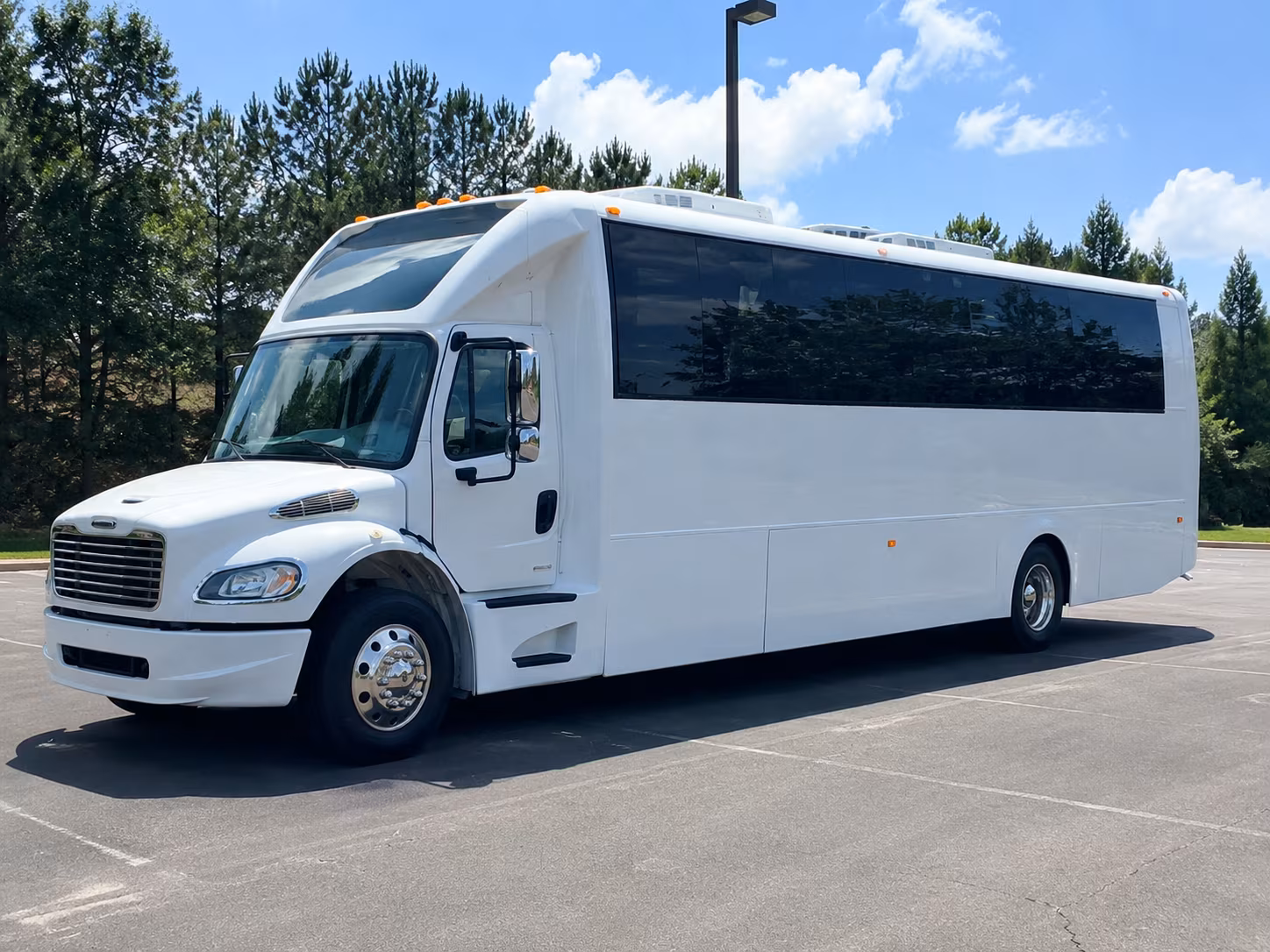 Group beside a Mercedes Sprinter limo in Edison